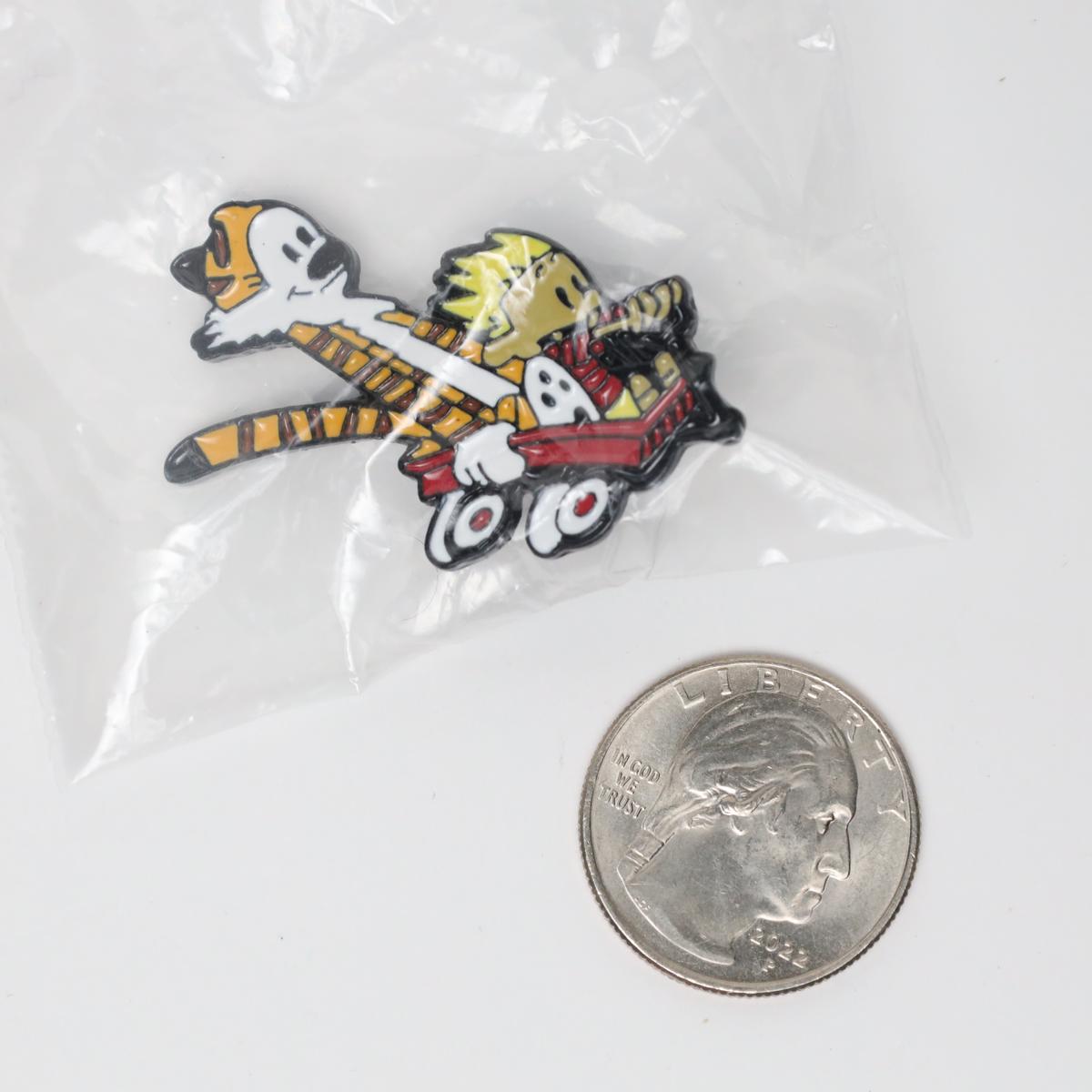 Calvin and Hobbes in Wagon Enamel Pin