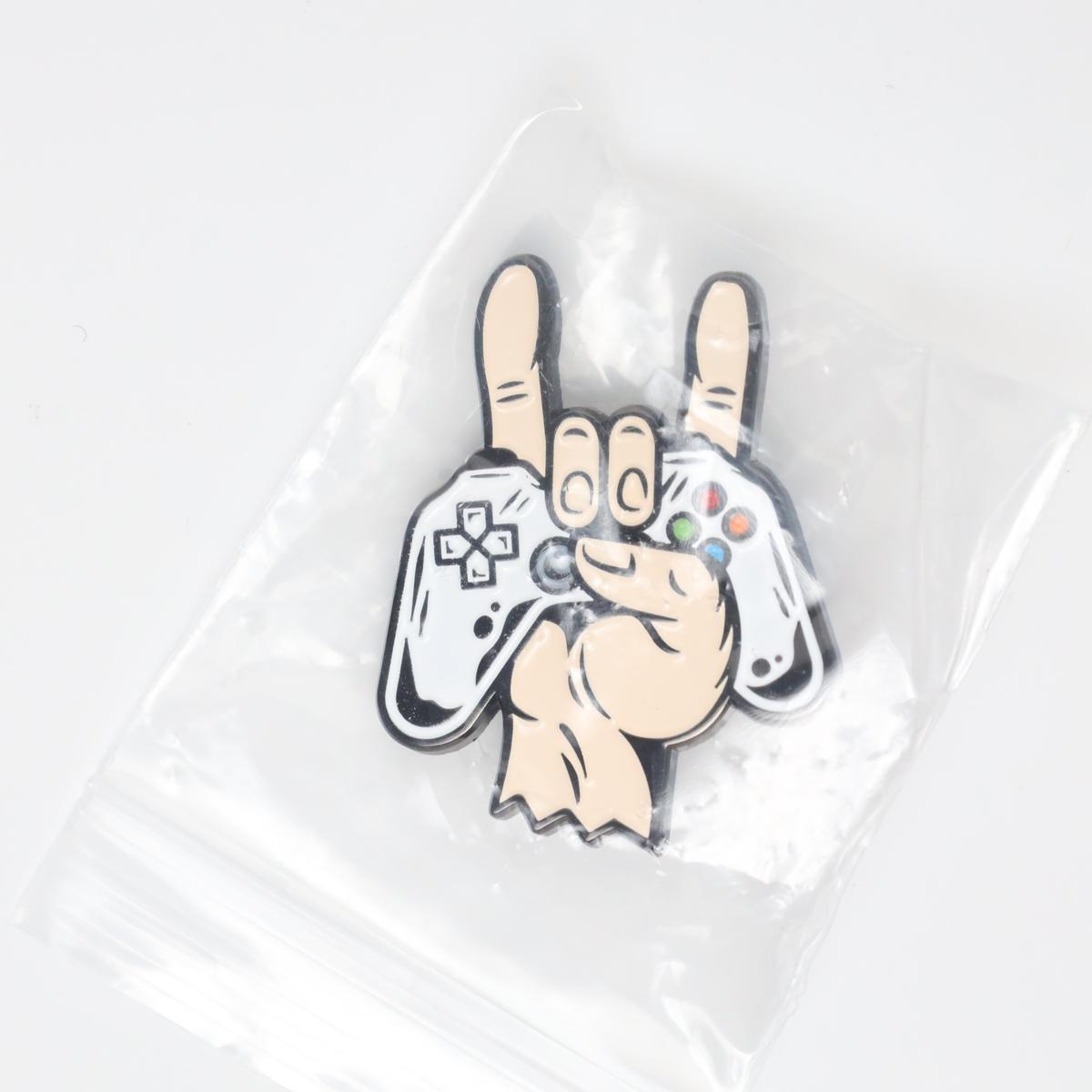 Rock Gamer Hands with Controller Enamel Pin
