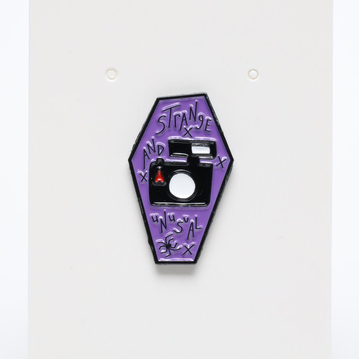 Strange & Unusual Linda’s Camera Beetlejuice Enamel Pin