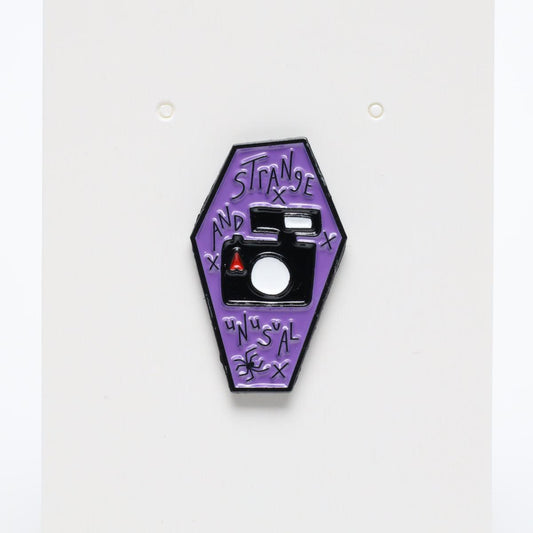Strange & Unusual Linda’s Camera Beetlejuice Enamel Pin